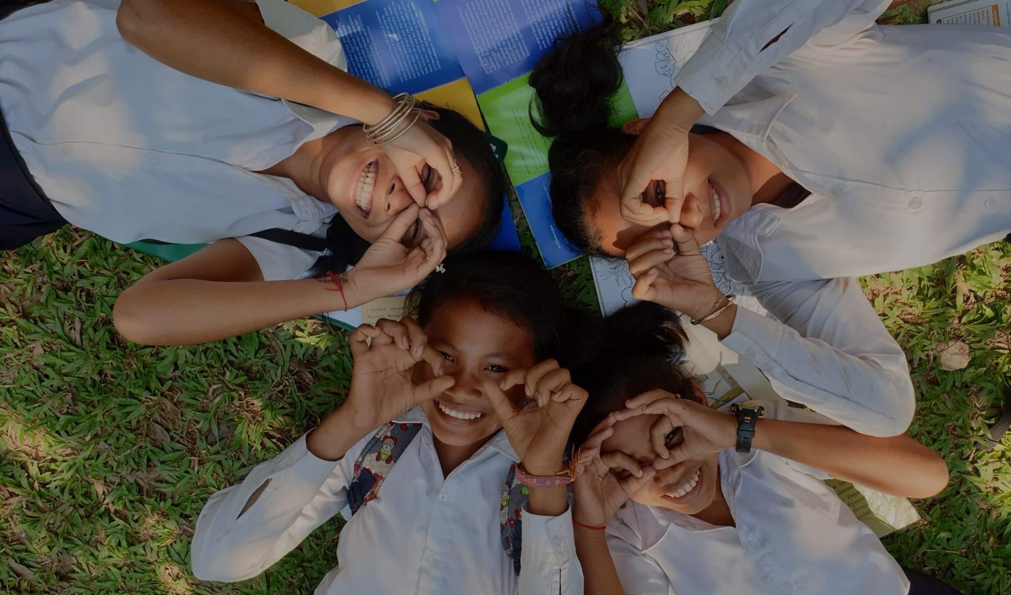 Girls covering faces